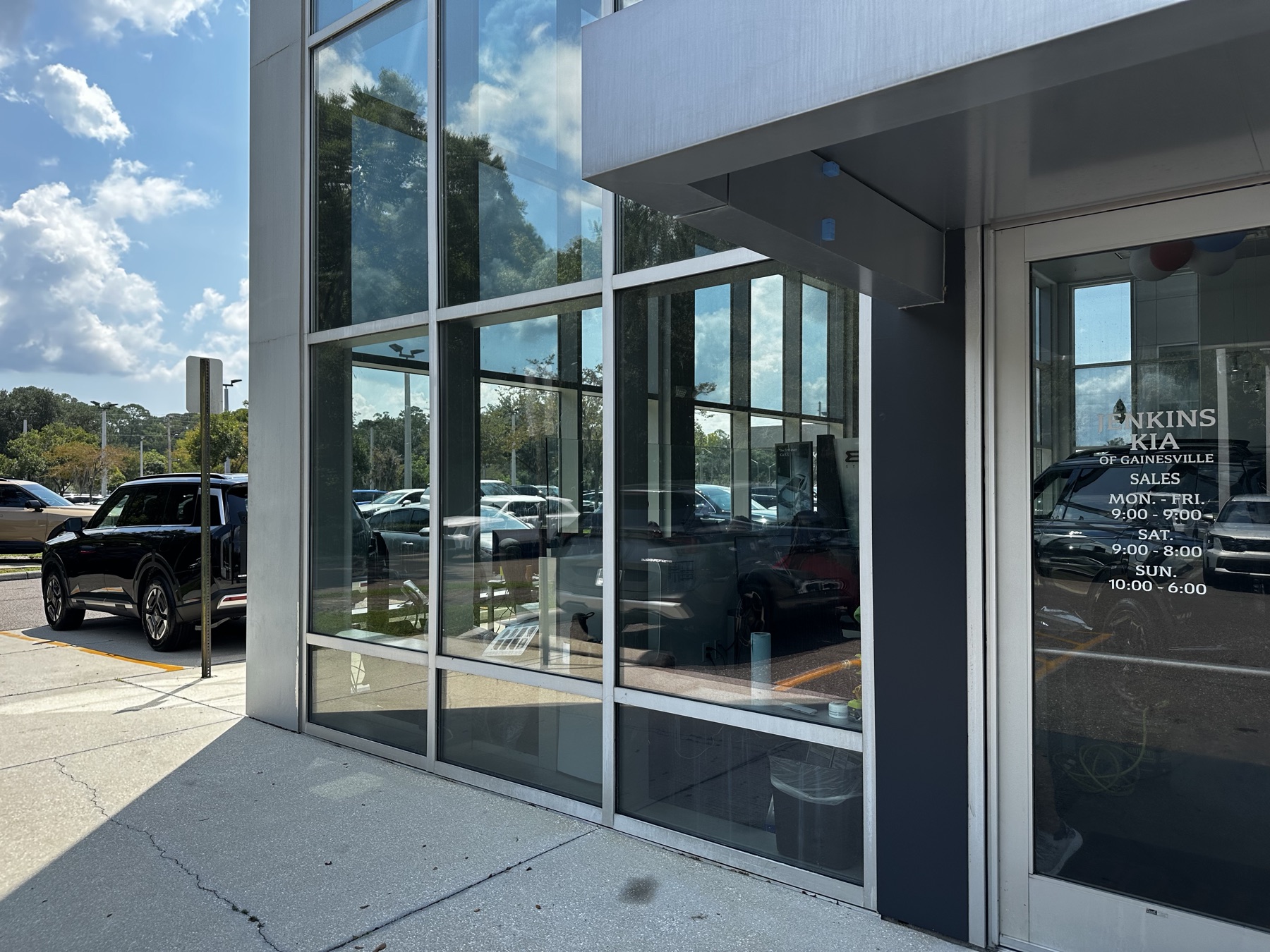 Tinted storefront glass beside the main entrance